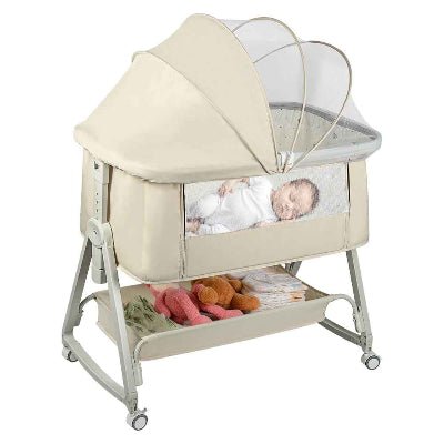 Bebe dormant paisiblement lit cododo evolutif portable beige